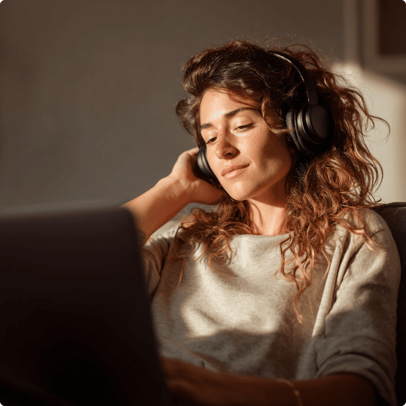 Person relaxing while listening to text-to-speech